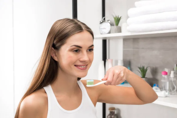 Girl going to brush teeth — Stock Photo