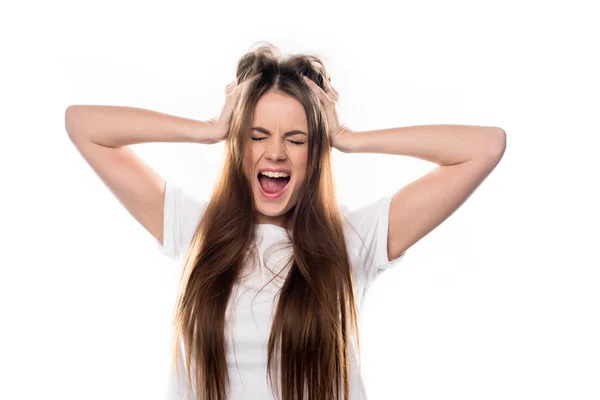 Mädchen schreit und berührt Kopf mit Händen — Stockfoto