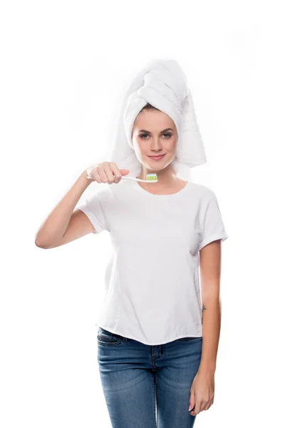 Girl standing with toothbrush and paste — Stock Photo