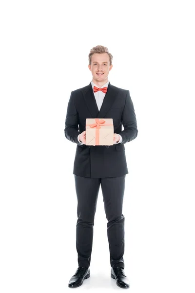 Fashionable man with gift box — Stock Photo