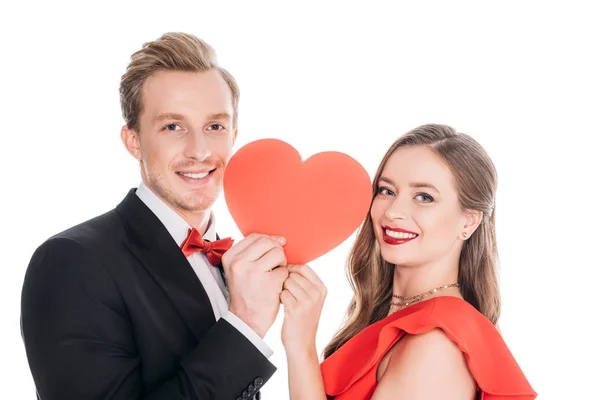 Couple with red paper heart — Stock Photo