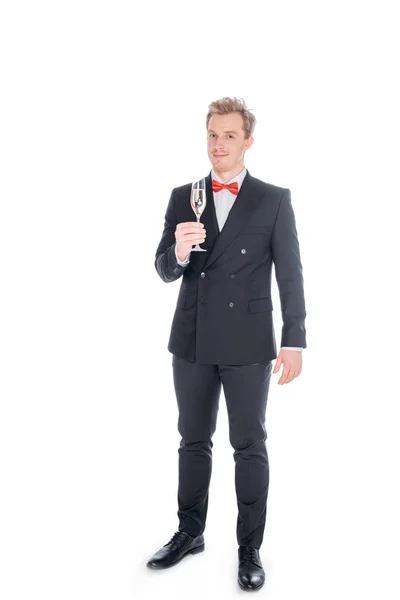 Uomo in giacca e cravatta con bicchiere di champagne — Foto stock