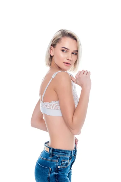 Bella donna sensuale posa in reggiseno, isolato su bianco — Foto stock