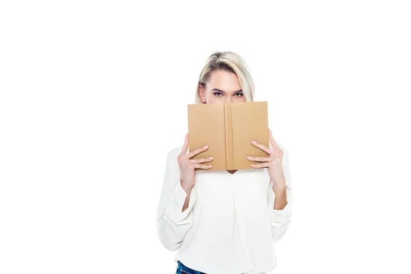 Beautiful blonde female student with book, isolated on white — Stock Photo
