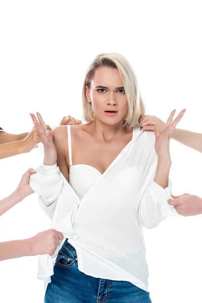 Багато рук роздягаються стильно стурбованою жінкою, ізольовані на білому — стокове фото