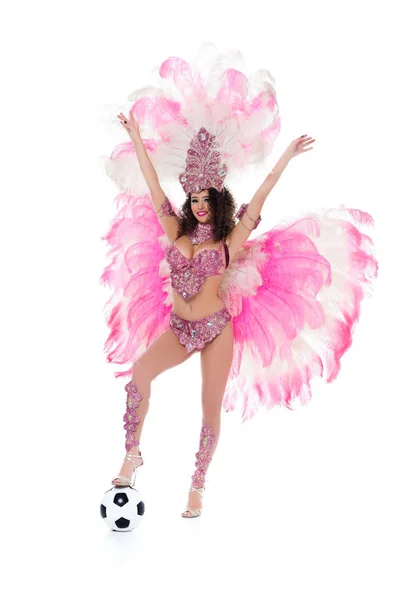 Woman in carnival costume with raised and  with ball at her legs, isolated on white — Stock Photo