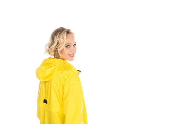Rückseite der schönen jungen Frau in gelbem Regenmantel isoliert auf weiß — Stockfoto