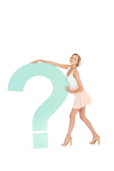 Smiling young woman with question mark isolated on white — Stock Photo