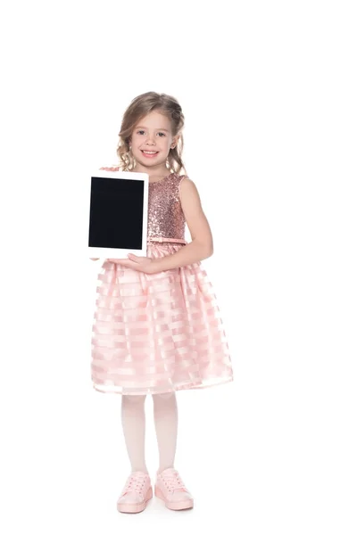 Adorable enfant présentant tablette numérique avec écran blanc, isolé sur blanc — Photo de stock