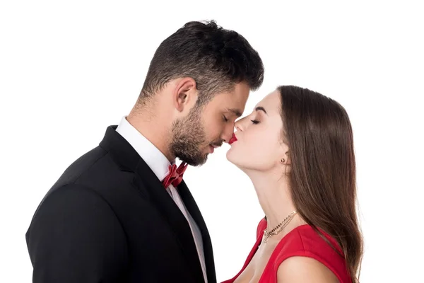 Side view of girlfriend kissing boyfriends nose isolated on white — Stock Photo