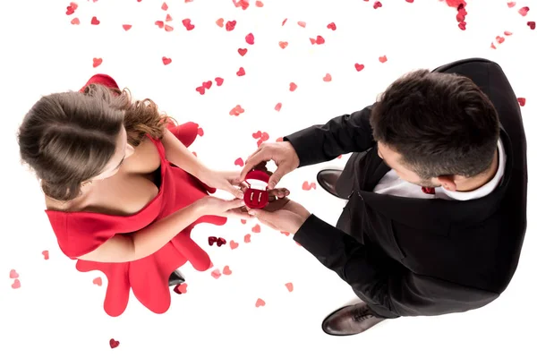 Overhead view of boyfriend proposing girlfriend isolated on white, valentines day concept — Stock Photo