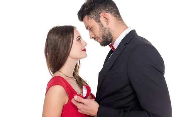 Side view of boyfriend proposing girlfriend isolated on white — Stock Photo