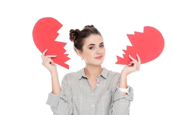 Girl holding two pieces of paper heart isolated on white, valentines day concept — Stock Photo