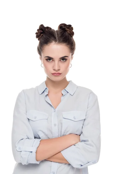 Angry girl with crossed arms isolated on white — Stock Photo