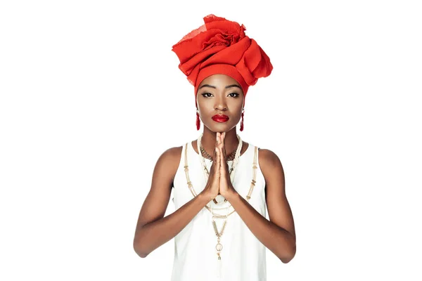 Junge afrikanisch-amerikanische Frau macht Gebetsgeste isoliert auf weiß — Stockfoto