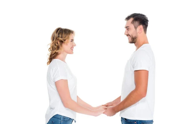 Happy couple holding hands, isolated on white — Stock Photo