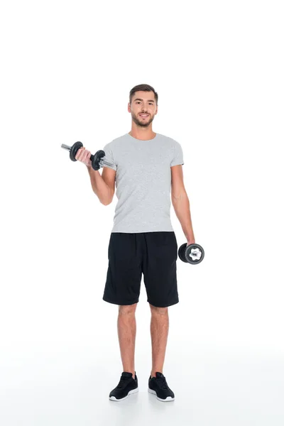 Desportista exercício com halteres isolados em branco — Fotografia de Stock