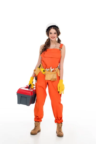 Beautiful workwoman in uniform holding toolbox, isolated on white — Stock Photo