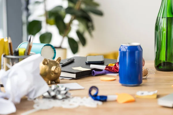 Close up view of soda drink, party decorations and notebook on tabletop in office — Stock Photo