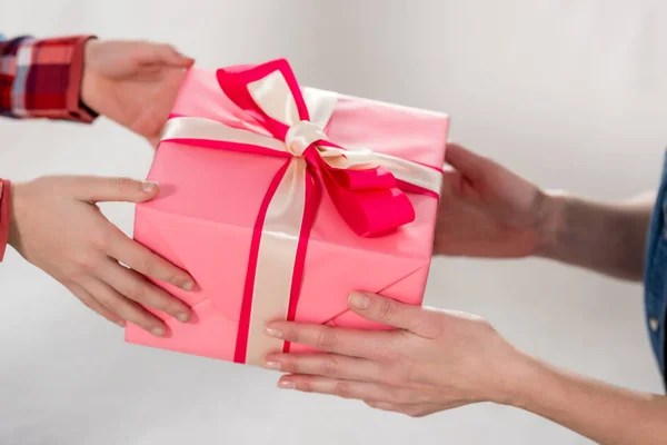 Cropped shot of son presenting mothers day gift to his mother — Stock Photo