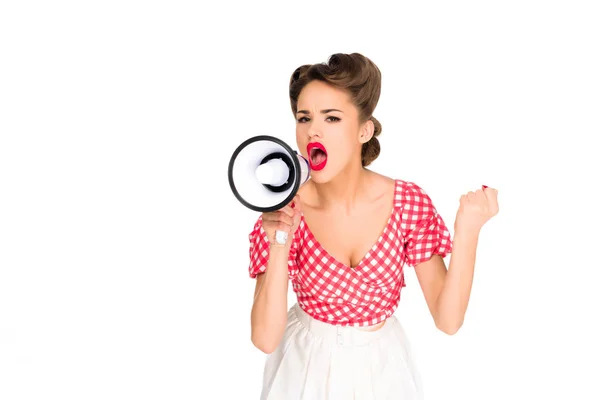 Portrait of fashionable young woman in pin up style clothing screaming into loudspeaker isolated on white — Stock Photo