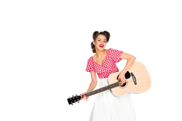 Portrait of cheerful woman in pin up clothing playing guitar isolated on white — Stock Photo