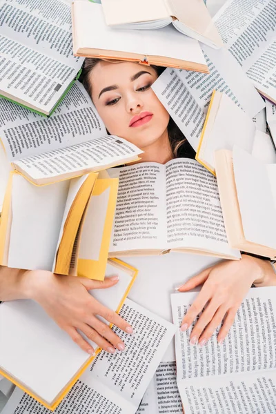 Beautiful girl with books above, education and reading concept — Stock Photo