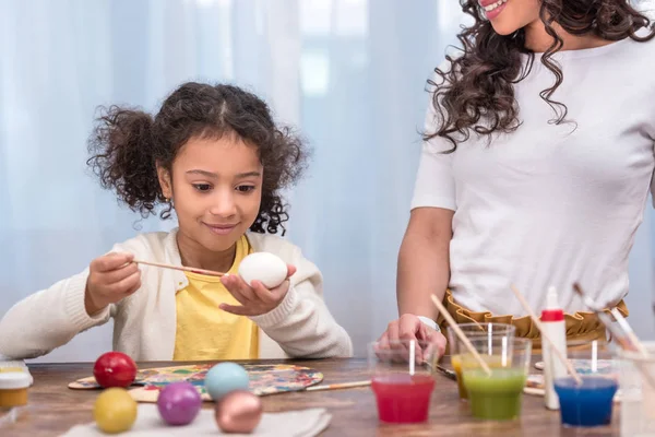 Painting easter eggs — Stock Photo