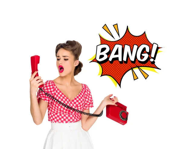 Portrait of pin up woman talking on old telephone with comic style bang sign isolated on white — Stock Photo