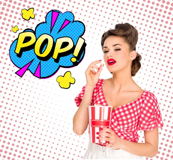 Portrait of beautiful young woman with popcorn and comic style pop sign isolated on white — Stock Photo