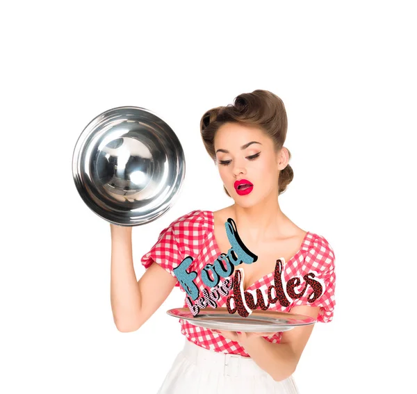 Beautiful young woman in retro clothing with food before dudes inscription on serving tray in hands isolated on white — Stock Photo
