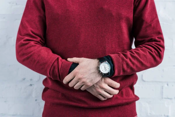 Partial view of man in stylish clothing with wristwatch — Stock Photo