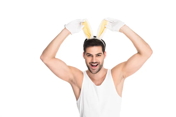 Homme souriant aux oreilles de lapin isolé sur blanc, concept de Pâques — Photo de stock