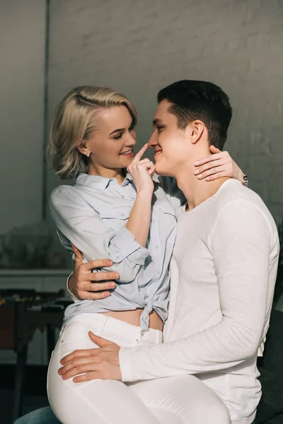 Sexy smiling couple hugging at home — Stock Photo