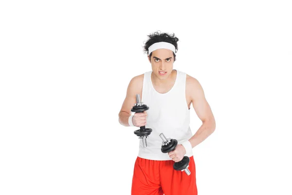 Thin man in sportswear exercising with dumbbells isolated on white — Stock Photo