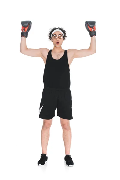 Young thin boxer in eyeglasses standing with arms up isolated onn white — Stock Photo