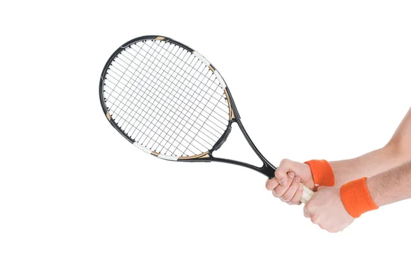 Обрезанное изображение теннисиста, держащего ракетку изолированной на белом — стоковое фото