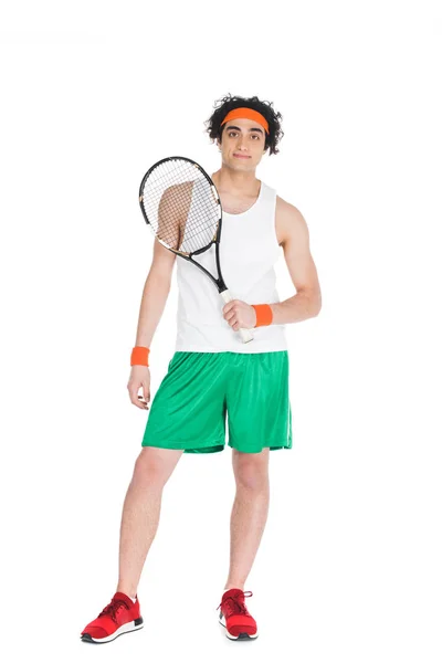 Thin tennis player in headband standing with racket isolated on white — Stock Photo