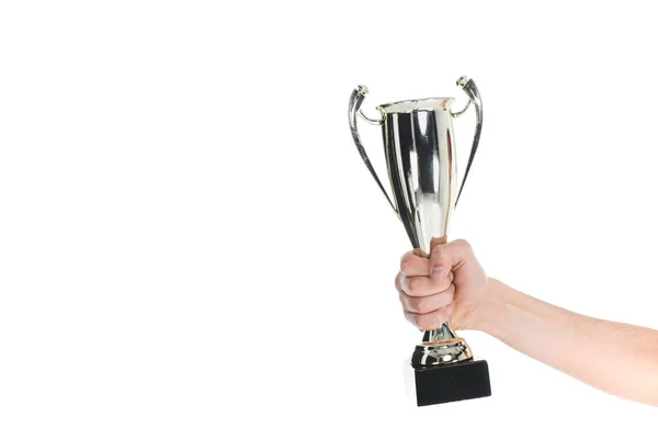 Close up view of silver trophy in hand of sportsman isolated on white — Stock Photo