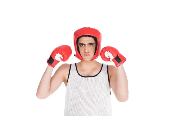 Esportista fino em pé em luvas de boxe e capacete isolado em branco — Fotografia de Stock