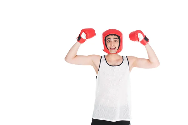 Smiling skinny sportsman in boxing helmet and gloves standing with arms up isolated on white — Stock Photo