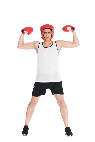 Тонкий боксер в шлеме и перчатках показывает мышцы, изолированные на белом — стоковое фото