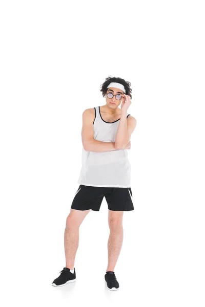 Skinny sportsman taking off eyeglasses isolated on white — Stock Photo