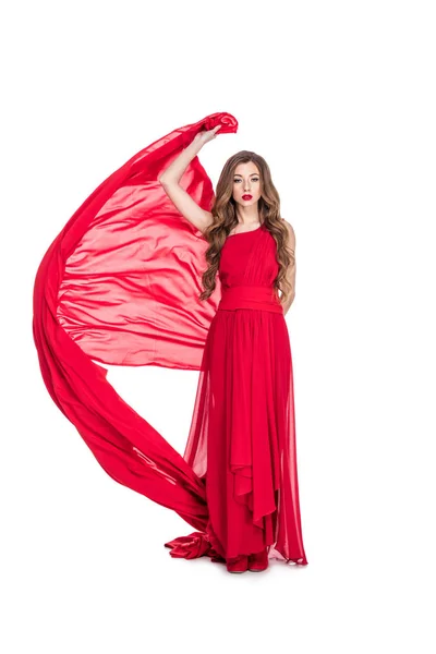 Menina atraente posando no vestido chiffon vermelho com véu, isolado no branco — Fotografia de Stock