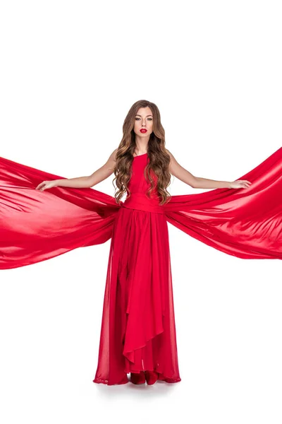 Glamouröses Mädchen posiert in rotem Kleid, isoliert auf weißem Hintergrund — Stockfoto