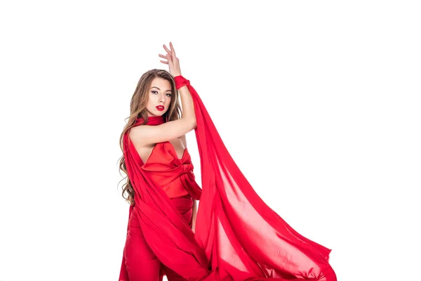 Elegantes Mädchen posiert in roter Kleidung, isoliert auf weißem Grund — Stockfoto