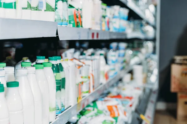 Selective focus of dairy products in supermarket — Stock Photo
