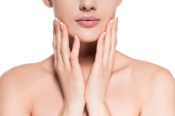 Cropped shot of young woman with clear skin touching her face isolated on white — Stock Photo