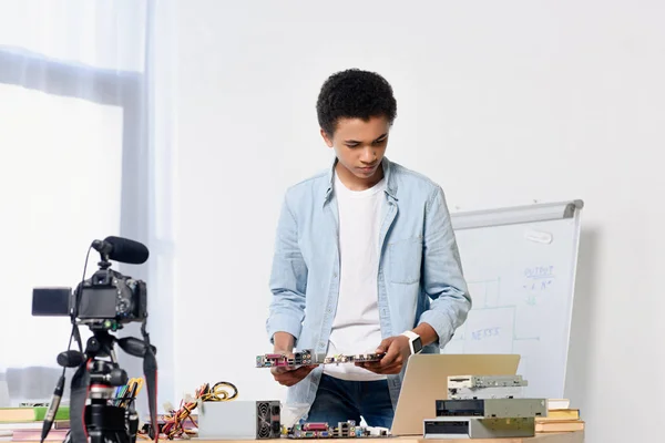 African american teenager preparing shooting tech video blog at home — Stock Photo