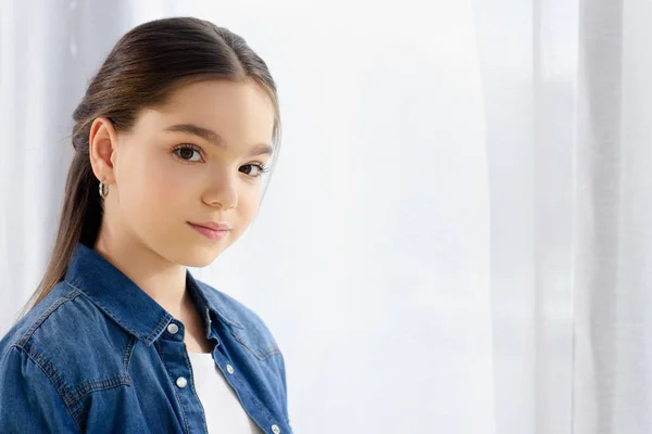 Portrait of adorable preteen child looking at camera at home — Stock Photo